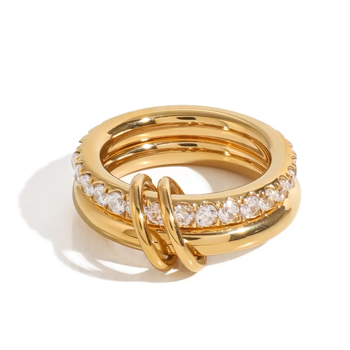 18K Gold Plated Interlocking Triple Band Ring for Women. Multi-layer linked design, one band paved with sparkling clear cubic zirconia. Waterproof stainless steel construction, durable and anti-tarnish. Chunky trendy style, great for everyday stacking, da