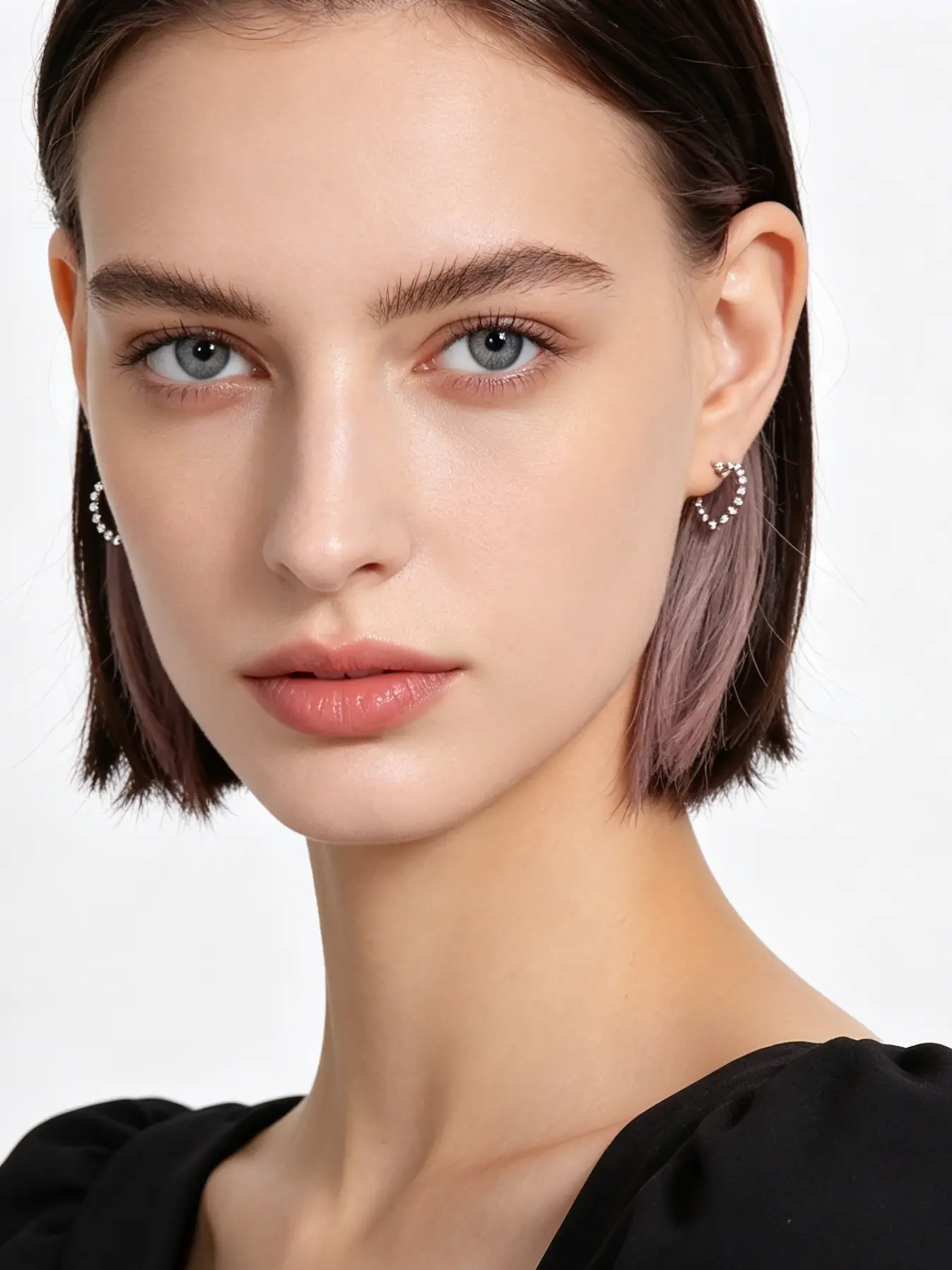 A pair of minimalist heart-shaped lacy earrings with smooth, delicate round beads, exuding a touch of playful charm. Perfect for daily commutes, dates, casual business settings, and more.