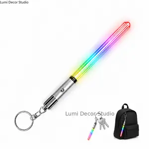 Mini LED Lightsaber Keychain Light Up Glowing Saber Toy Keychain With 8 Color Modes Portable Handheld Glow Stick Pendant LED Flashlight Style Decorative Accessory Suitable Bag Keyring Car Key Pendant Collectible Gadget Durable Lightweight Fun Outdoor Nigh