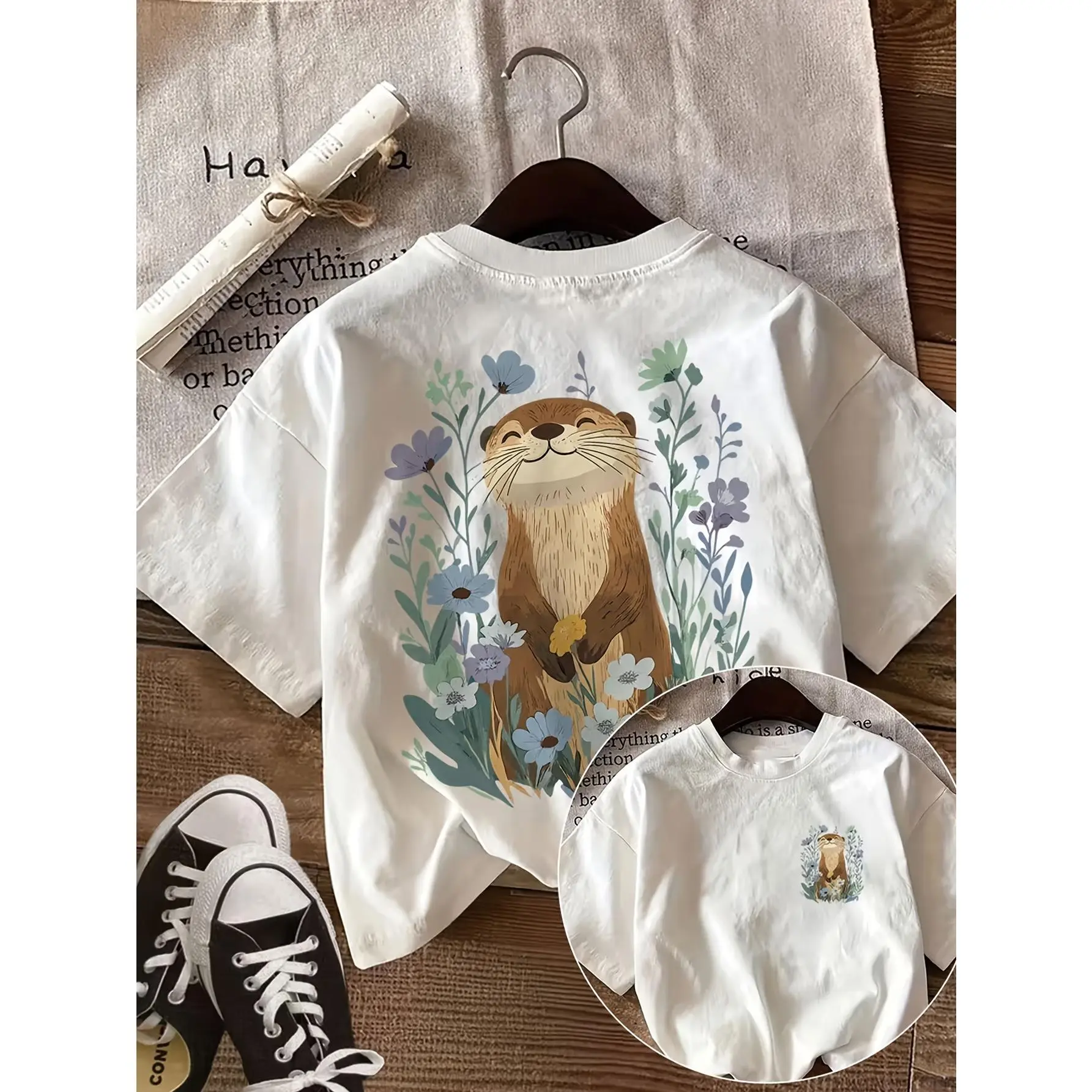 Cute Floral Otter Double Sided T-Shirt, Wildflower Happy Otter Back Print, Small Otter Chest Graphic Short Sleeve Tee, Nature Wildlife Aesthetic Casual Top, Lovely Animal Lover Crew Neck Shirt For Women