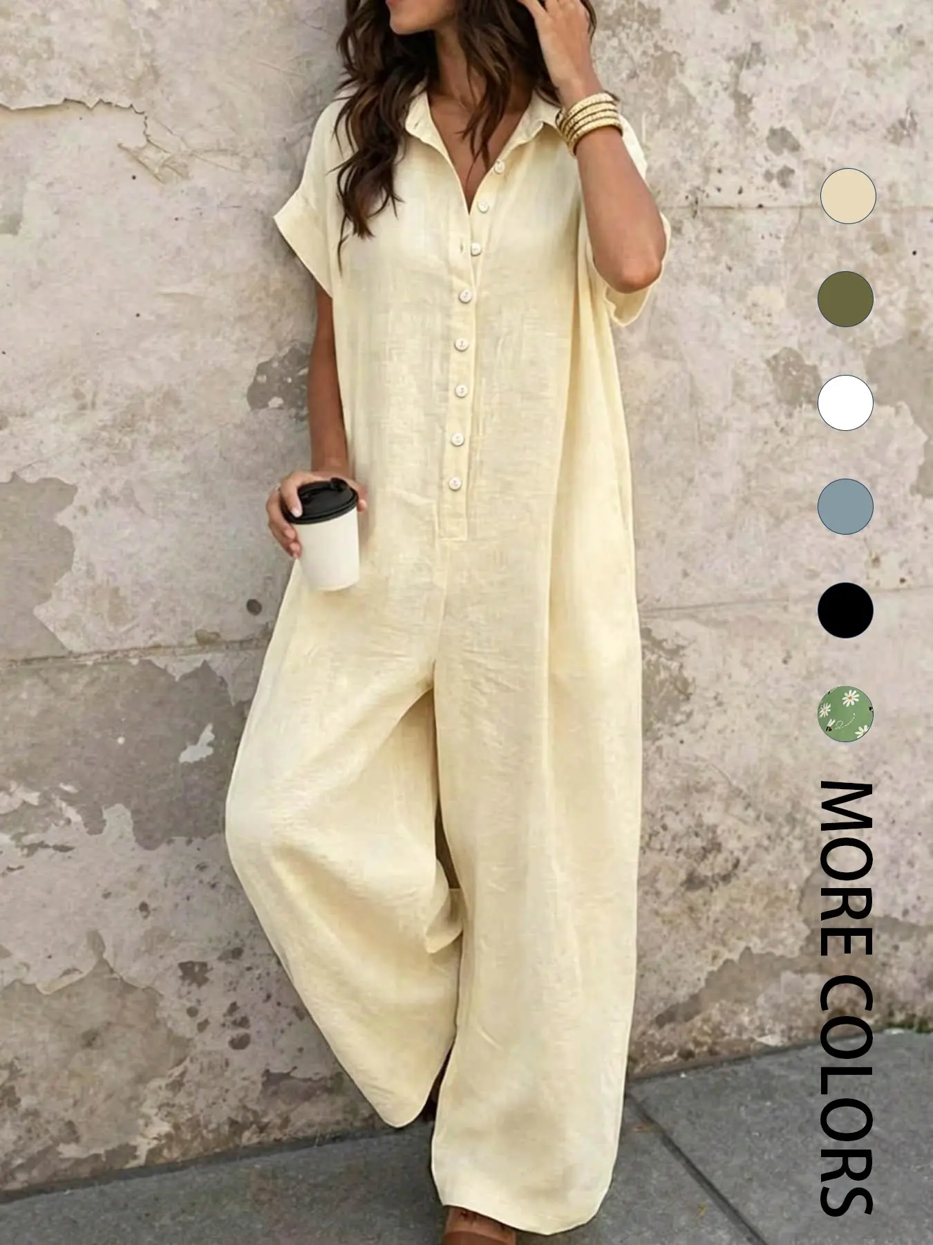 A lady's fashion French casual minimalist lazy-fit jumpsuit with a loose button-up design, featuring slimming wide-leg style. Perfect for summer, suitable for light social occasions, afternoon tea, vacation trips, commuting, and at-home wear.