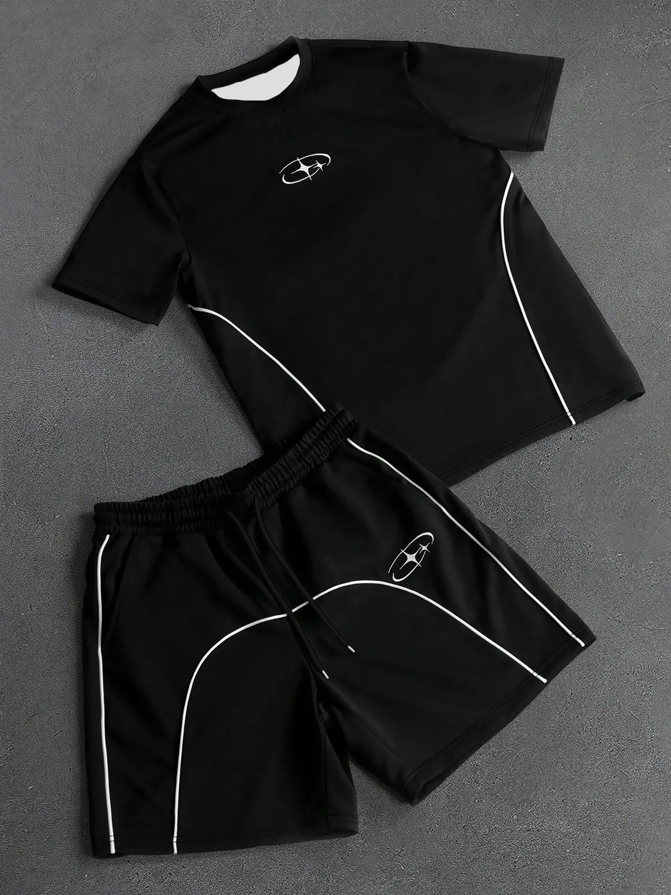Men's two-piece sports set, black-and-white contrast trim T-shirt & drawstring shorts, simple star trail logo print, breathable and soft fabric, lightweight summer set for gym, skateboarding, and everyday casual wear.