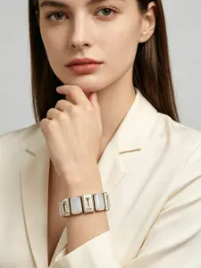 A modern geometric moonshine stone bracelet with a white enamel base and diamond inlaid details, suitable for daily commuting, dinners, and dates, and is also an exquisite gift to convey one's feelings.