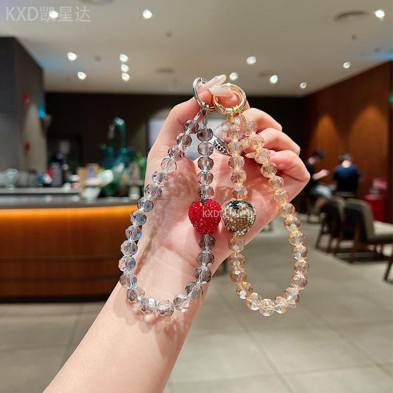 Premium sense rhinestone strawberry mobile phone chain crystal wrist beaded lanyard anti-drop crystal mobile phone chain anti-lost key chain Wireless Charm Aesthetic Cloth Smartphone Cellphone