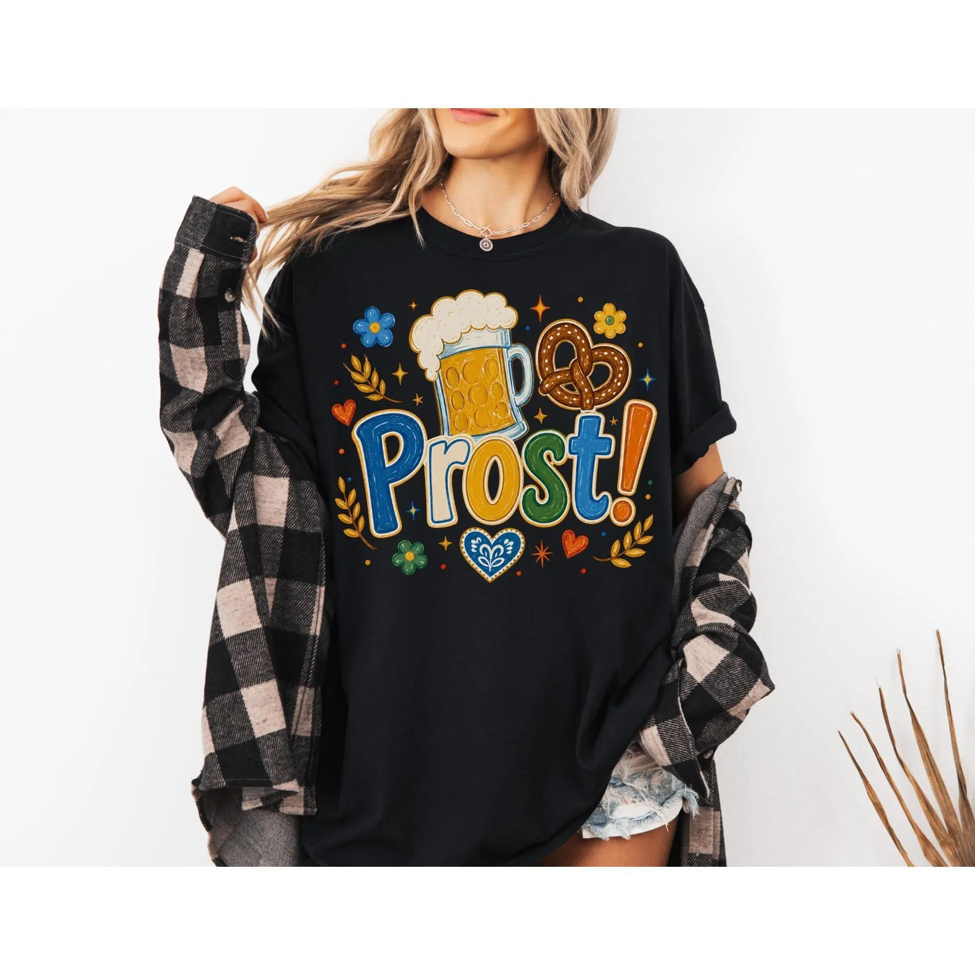 Women's "Prost" graphic T-shirt—a casual, short-sleeved Oktoberfest top. This soft, pure cotton essential is designed for beer lovers and features a relaxed fit, a crew neck, and a fun graphic print.