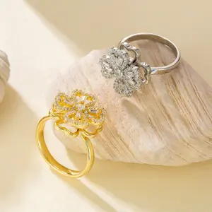 Micro-inlaid zirconia rotating four-leaf clover ring, adjustable opening, fashionable and versatile, elegant and light luxury style ring, women's accessory