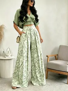 Two piece set for ladies with a high-end vacation style and light luxury commuting style, featuring a retro ink wash flower and bird print design, suitable for all seasons, daily commuting, vacation, and party dressing.