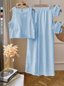 Women's simple and slimming solid color sleeveless vest and trousers set, suitable for daily commutes and dates, or a rustic romantic brunch set.