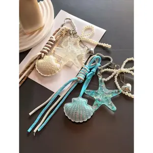 Coastal Starfish Shell Bag Charm Keychain, Ocean Aesthetic Purse Charm with Bow & Heart Pendant, Cute Beachcore Accessory, Lightweight Woven Strap for Tote Bags, Backpacks, Keys, Travel Gift