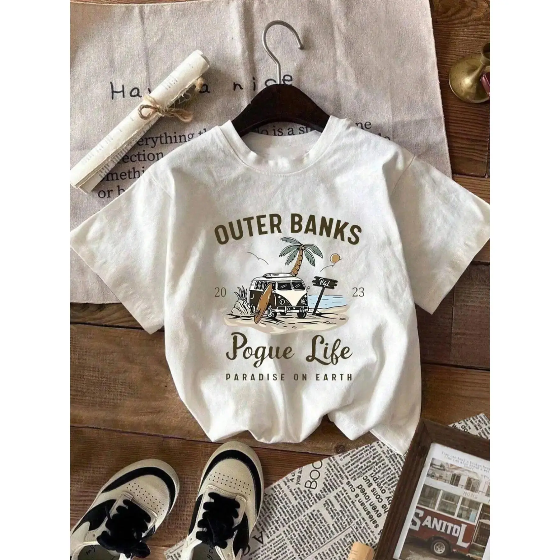 Outer Banks Pogue Life Paradise On Earth Graphic T-Shirt, Vintage Beach Van Surf Print Tee, Oversized [100% cotton] Shirt, Retro Coastal Vacation Style Short Sleeve Top, Boho Beachy Cotton Tee for OBX Fans and Summer Travel Outfits