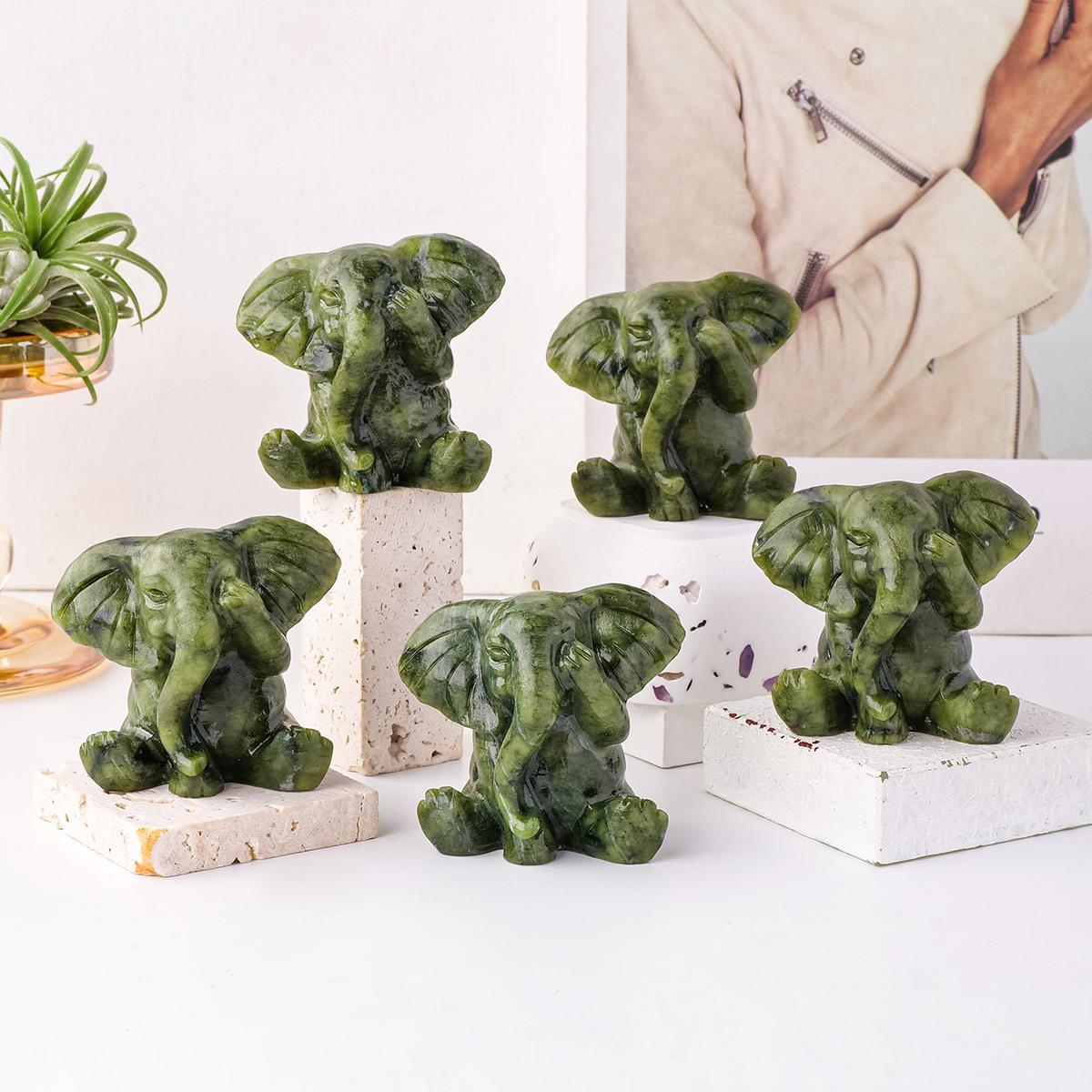 A Natural Jade Elephant Ornament—A Hand-Carved Masterpiece Infused with Spiritual Energy; A Serene Home Décor Accent and Healing Crystal Art Piece—A Distinctive Gift Rich in Symbolic Meaning. A Natural Jade Elephant Ornament—A Hand-Carved Masterpiece Infused with Spiritual Energy; A Serene Home Décor Accent and Healing Crystal Art Piece—A Distinctive Gift Rich in Symbolic Meaning.