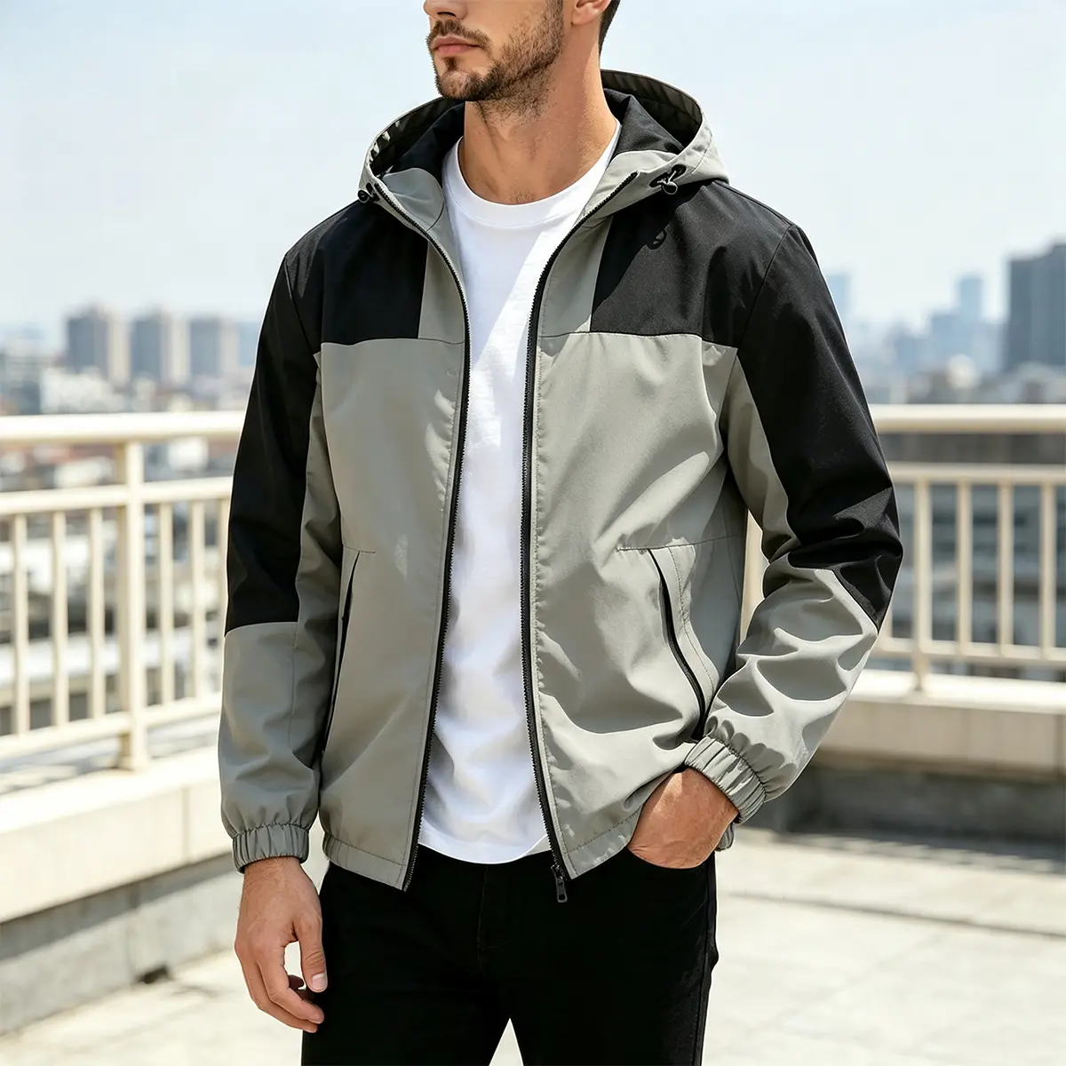 Men jacket color‑block hooded windbreaker jacket grey‑black patchwork design drawstring adjustable hood elastic cuffs hem water‑repellent woven fabric full zip outerwear for spring autumn daily urban street casual outfits
