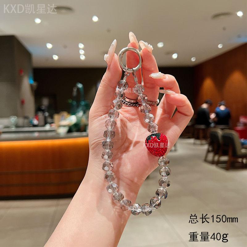 Premium sense rhinestone strawberry mobile phone chain crystal wrist beaded lanyard anti-drop crystal mobile phone chain anti-lost key chain Wireless Charm Aesthetic Cloth Smartphone Cellphone