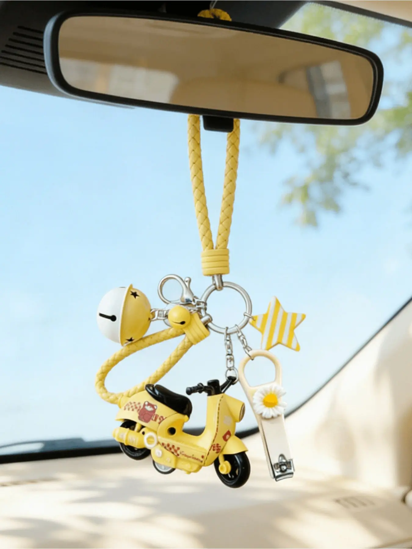 Creative scooter and motorcycle-shaped keychain, with a two-tone bell, striped star decoration, and a portable nail clipper. Cute car keychain for girls, perfect as a bag charm or bike accessory, can hang car keys.