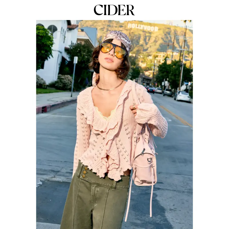 Cider Knit Bell Sleeve Ruffled Hem Knotted Hollow Out Cardigan