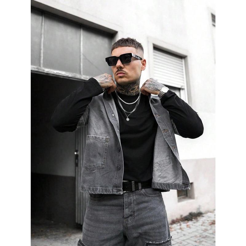 Cropped vintage washed denim trucker jacket with lapel collar, front button placket and dual patch chest pockets relaxed cropped silhouette minimalist layering outerwear staple for edgy urban modern mensfashion styling