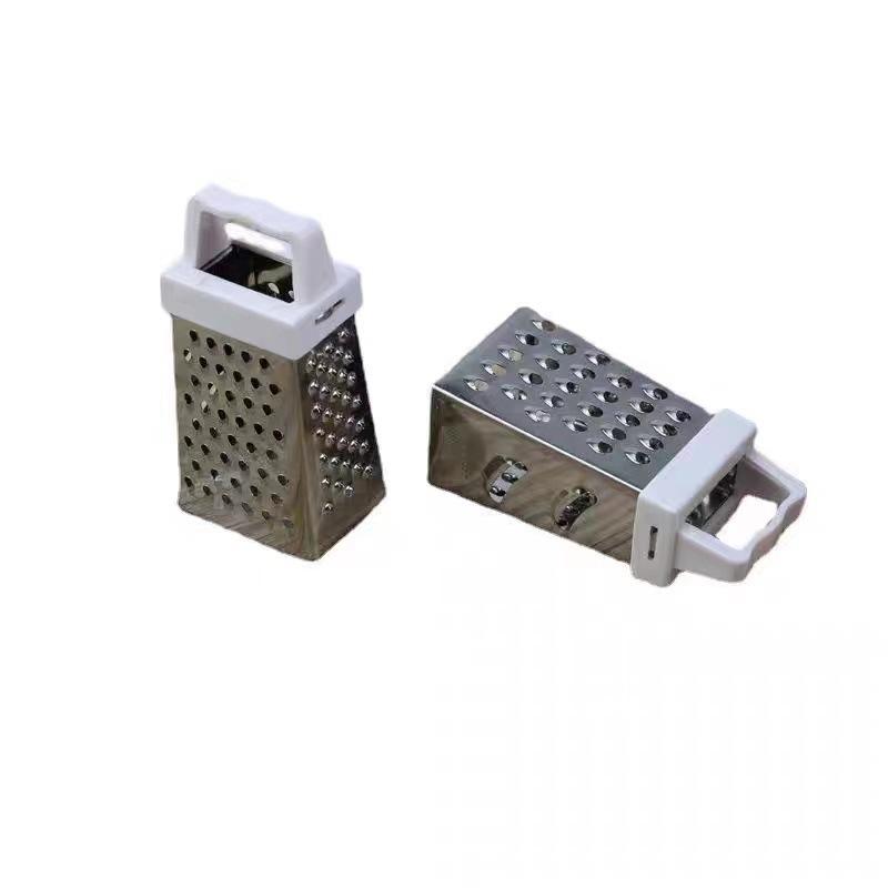 Multifunctional stainless steel household tool for peeling garlic, slicing vegetables and fruits, and shredding potatoes