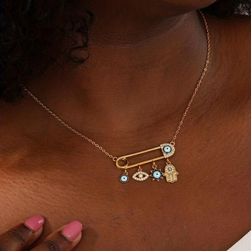 Golden Plated Evil Eye Hamsa Hand Choker Necklace with Rhinestone Safety Pin Charm – Boho Lucky Amulet for Women and Girls