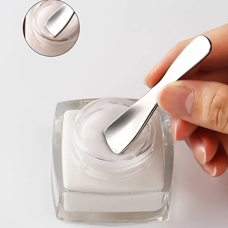 2 pieces of stainless steel face cream scrapers – hypoallergenic, multi-purpose tools for applying eye creams and lip balms; durable, smooth design for precise scooping; essential for skincare | stylish metallic finish | low-allergenic material.