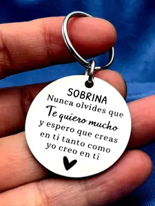 1 Inspirational Keychain for Your Niece or Nephew – Engraved with a Spanish quote and featuring a circular lettering design; the perfect Christmas or graduation gift from an aunt