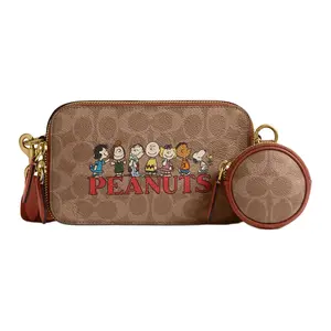 Coach x Peanuts Snoopy Signature Charter 19 Handbag for Women, Crossbody or Clutch, Brown