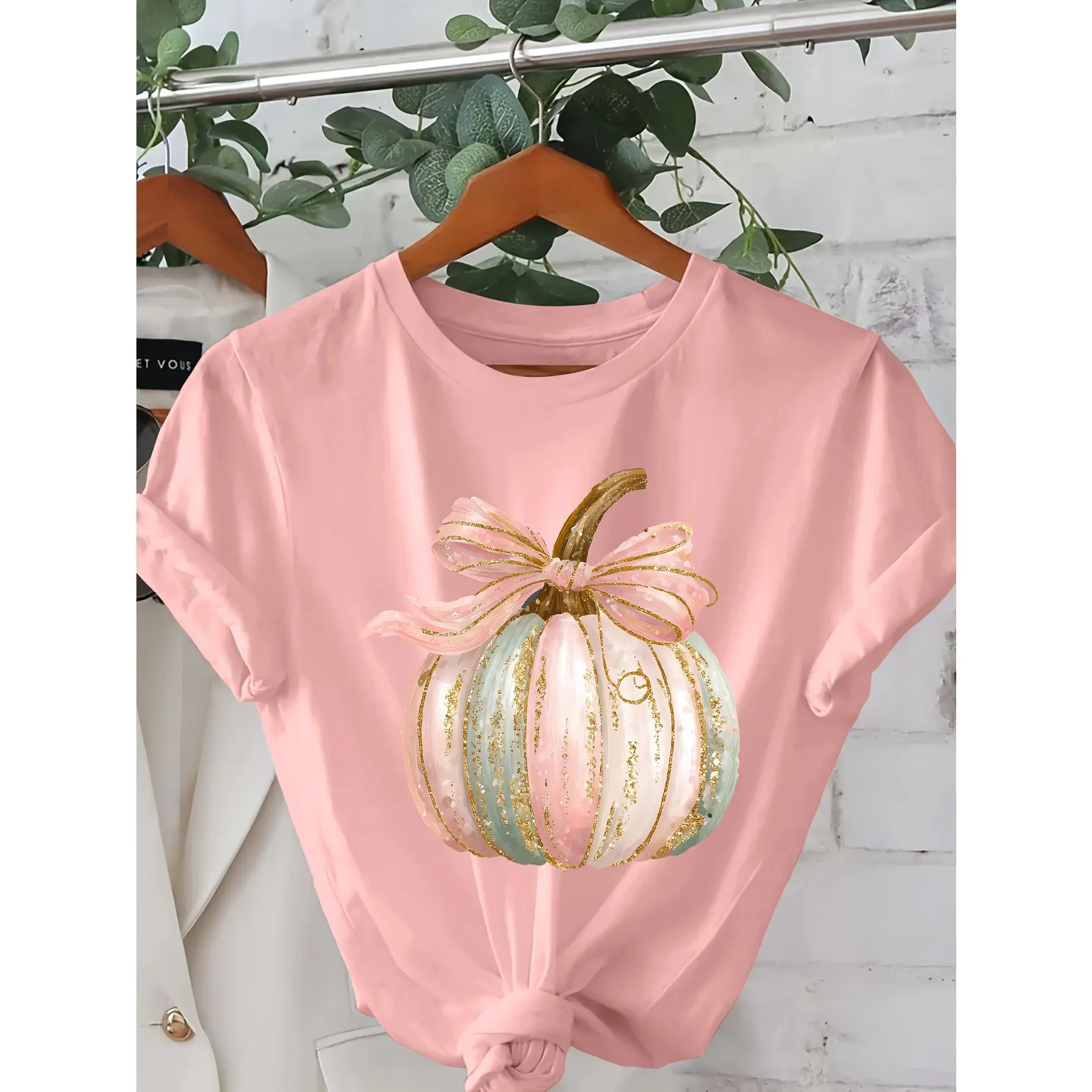 Casual Short-Sleeve T-Shirt for Women Featuring a Cartoon Pumpkin Design, Adorned with Pink And Blue Glitter. This Lightweight Top Is Perfect for Summer And Spring