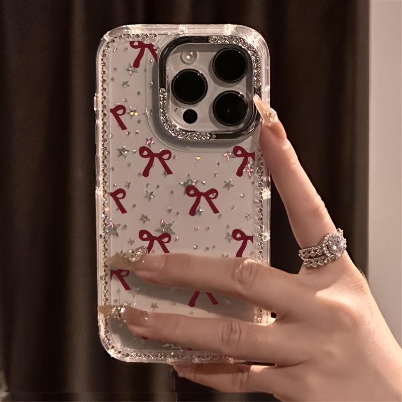 Wine-red bow pattern, transparent rhinestone frame with star design, shockproof, sparkling protective case, compatible with iPhone 17, 16, 15, 14, 13, 12 and other models. Makes a great gift for friends or family.
