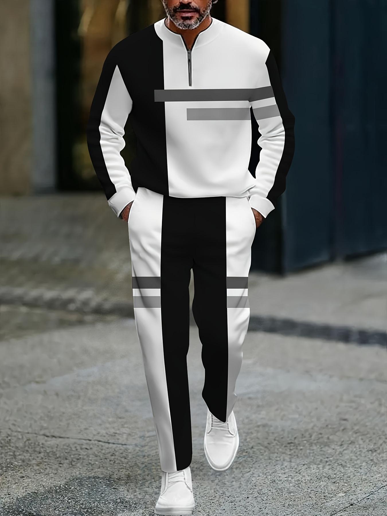The new men's color-blocked sports suit, featuring a white half-zip sweater paired with matching trousers, is adorned with black and yellow stripes, exuding a trendy vibe. The fabric is comfortable and skin-friendly, suitable for daily commuting and casua
