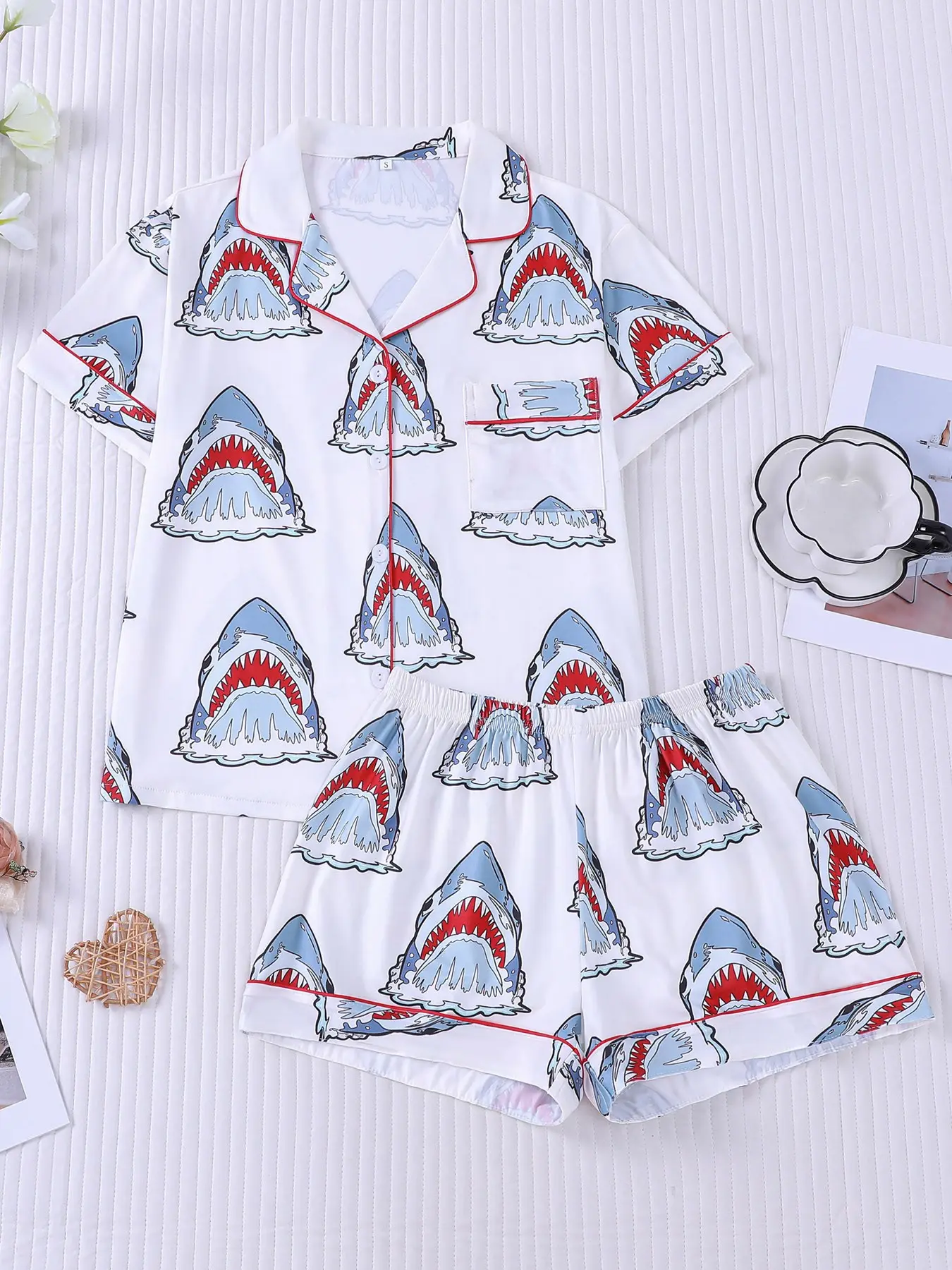 Women's 2-piece pajama set, Nightwear loungewear set with cartoon great white shark & wave prints on white base, red contrast piping. Lapel short sleeve top with pocket, soft elastic waist shorts, all-season casual Pyjamas
