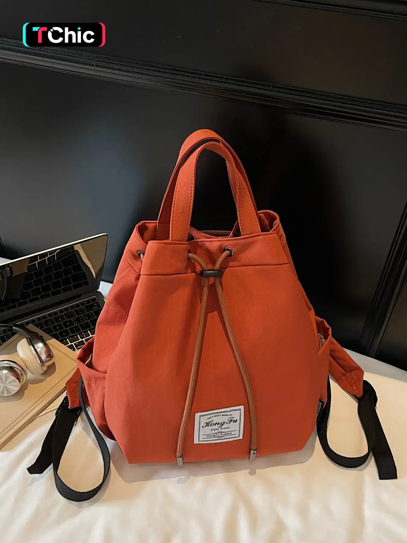 Drawstring closure backpack, casual and stylish with large capacity for easy storage, lightweight backpack for daily work, commuting, or short trips, perfect for carrying personal items, simple and portable with both shoulder straps and a handle.