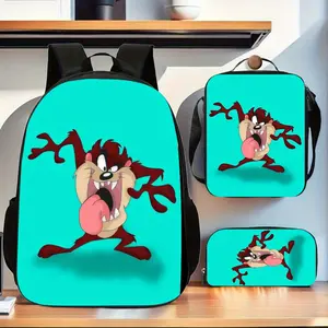TAZ Tasmanian blue background with tongue-out big mouth monster print three-piece school bag set, cartoon-style shoulder bag, insulated lunch box, zippered pencil case, suitable for daily use by teenagers