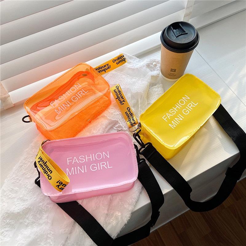 Fashion Mini Girl Clear Jelly Bag Neon Transparent Crossbody Bag with Adjustable Black Strap Waterproof Mini Shoulder Bag for Coins Lipstick and Keys Trendy Y2K Inspired Accessory Ideal for Summer and Streetwear