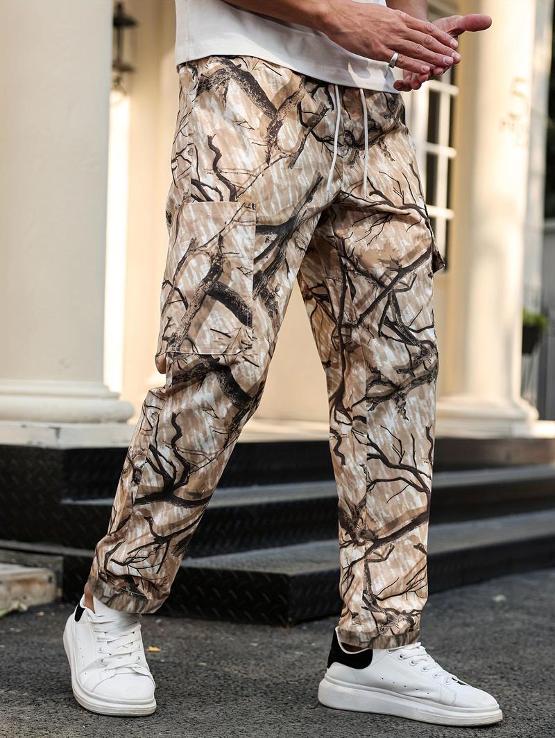 Men's camouflage print zippered pocket trousers, slim-fit athletic pants, durable trousers for autumn, men's wear-resistant outdoor training pants, streetwear fashion, vacation wear, men's clothing
