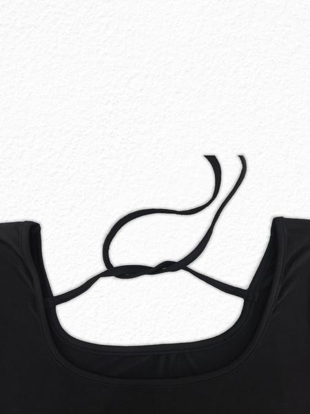 A women's elegant casual square-neck short-sleeved top with a bohemian floral print jumpsuit, a comfortable style for beach vacations and events.