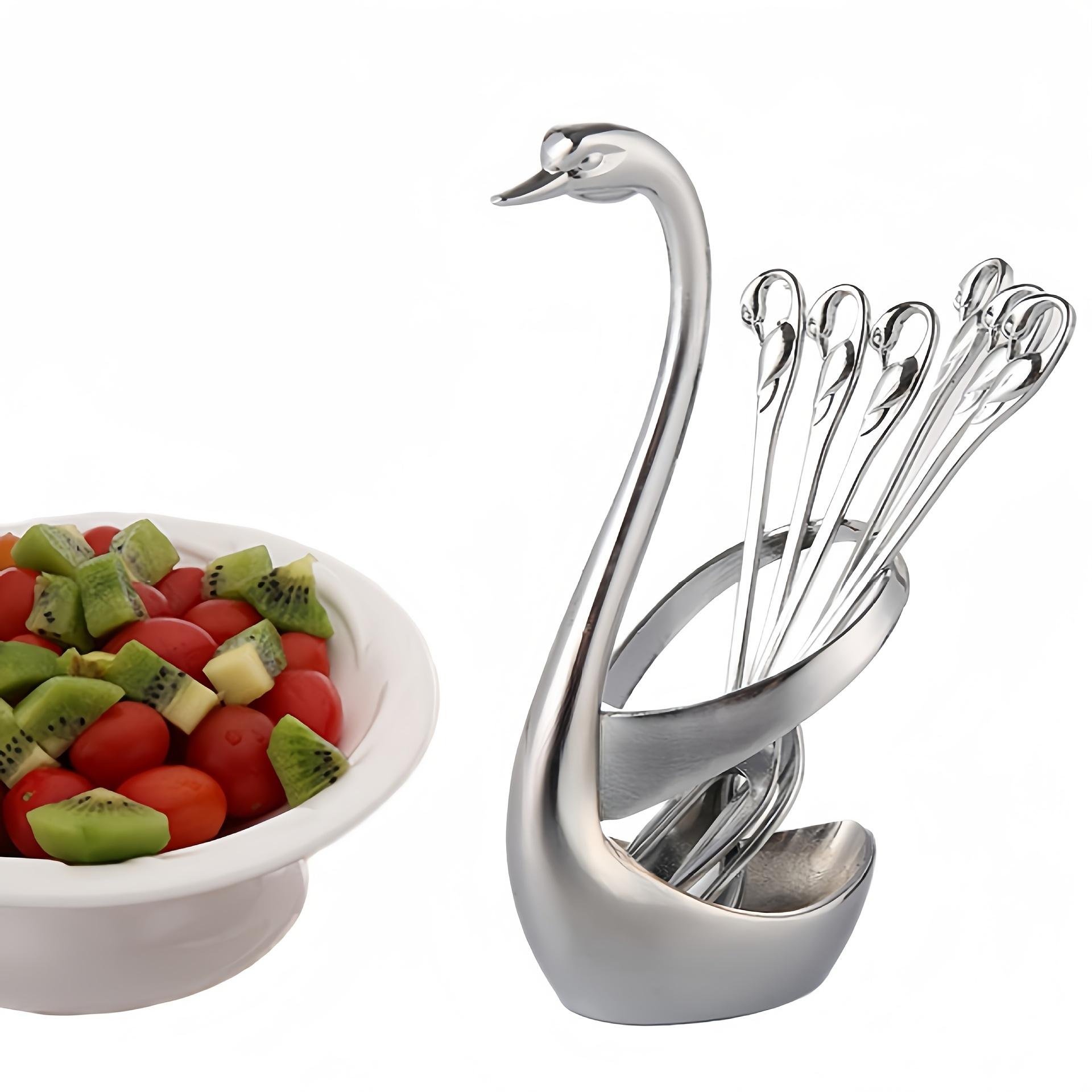 A 7pcs Stylish Cutlery Holder Designed Like a Swan, Including One Swan And Three Forks And Spoons Made of Zinc Alloy. This Elegant Stainless Steel Cutlery Rack Comes with a Complimentary Set of Forks And Spoons