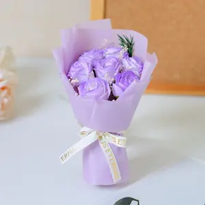 A mini Valentine's Day bouquet with 7 crushed ice blue rose soap flowers and baby's breath dried flowers