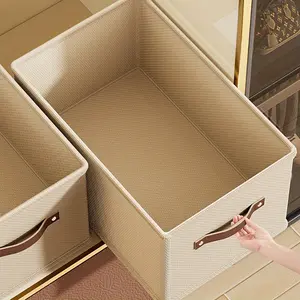 A winter closet clothing storage box (with handle), a foldable rectangular basket, a fabric container box for organizing shelves, suitable for the bedroom, in gray and beige colors, Clothes Storage Boxes