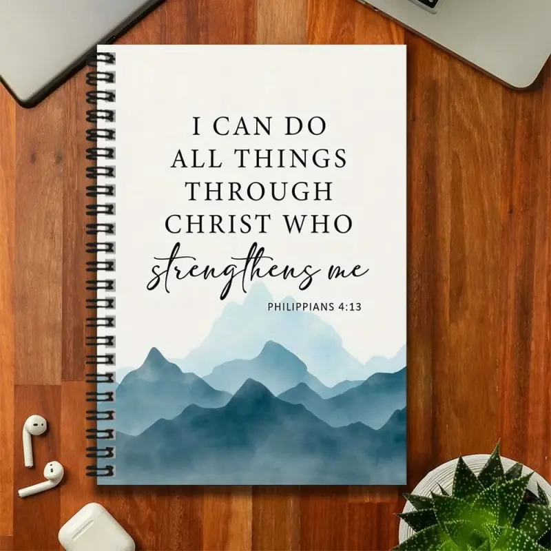 An inspirational Bible verse spiral-bound notebook, featuring the phrase "I can do all things through Christ who strengthens me" (Philippi 4:13) printed on the cover, along with a landscape motif. Suitable for work and study records, writing diaries, maki
