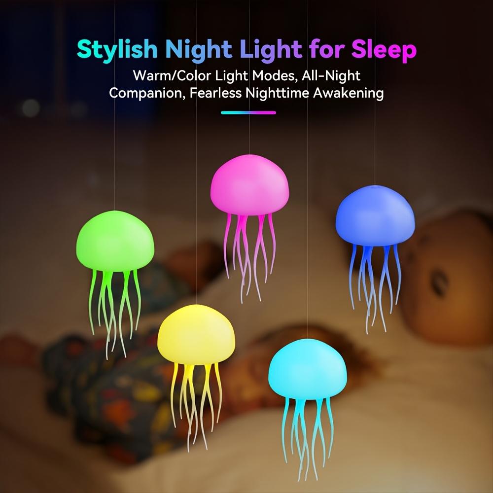 A Contemporary LED Lamp Designed Like a Jellyfish, Featuring Voice Control, a 2000Mah Lithium Battery, Full-Color Gradients, And Realistic Tentacles. It Offers an Extended Battery Life And Can Be Used As a Freestanding Or Hanging Decoration for Your
