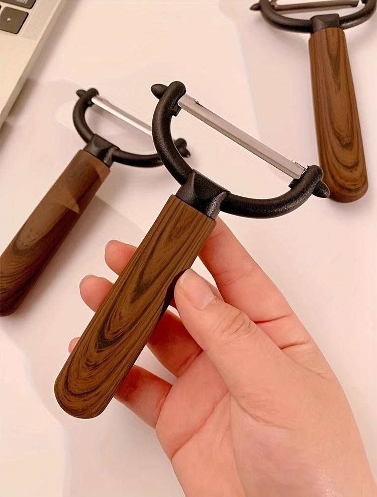 Multi-Use Vegetable Fruit Peeler - Vintage Faux Wood Grain, Sharp Stainless Steel Blade, Ergonomic Handle | Peels Potatoes, Apples, Carrots, Dishwasher Safe | Gift-Worthy Home Cooking Tool Multi-Use Vegetable Fruit Peeler - Vintage Faux Wood Grain, Sharp Stainless Steel Blade, Ergonomic Handle | Peels Potatoes, Apples, Carrots, Dishwasher Safe | Gift-Worthy Home Cooking Tool