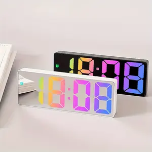 1Pc Trendy LED Mirror Digital Alarm Clock, silent non-ticking movement with clear temperature readout and alarm alert. Comes with adjustable screen brightness, low-power design, sleek decor clock for bedroom nightstand, home and office desk.