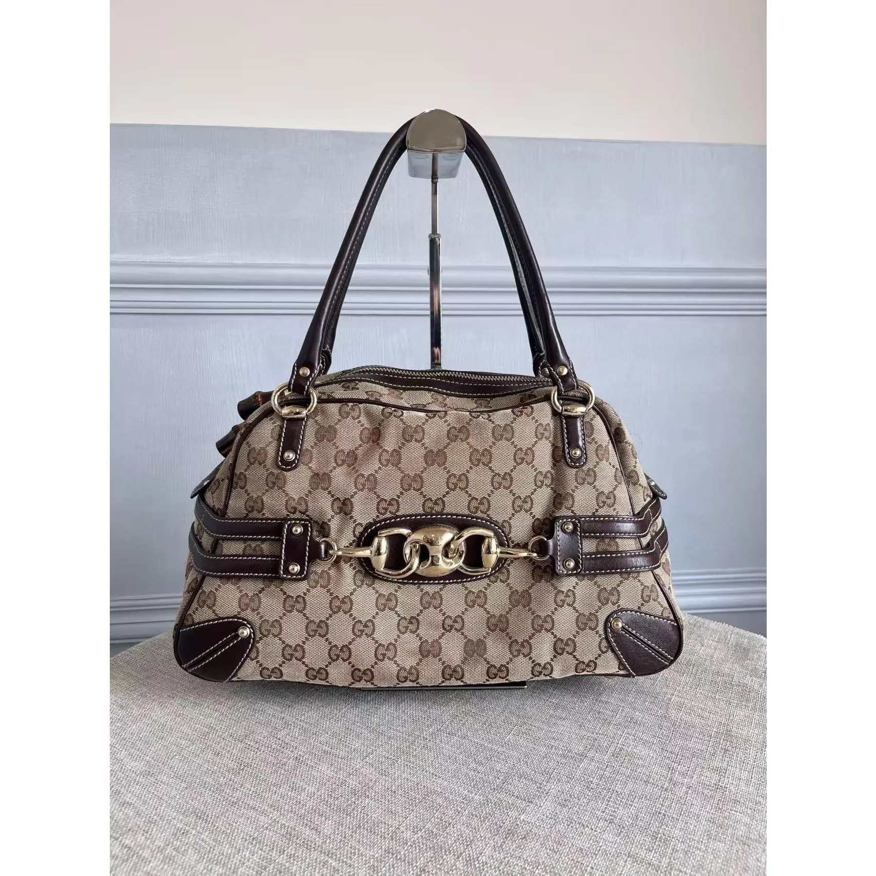 Pre-owned GUCCI Authentic Vintage GG Monogram Canvas Bowling Ball Bag Horsebit Detail, Gold Hardware, Dark Brown Leather Trim, Bamboo Accent, Top Handle, Zip Closure, Authenticity Cert., Everyday Use Handbag