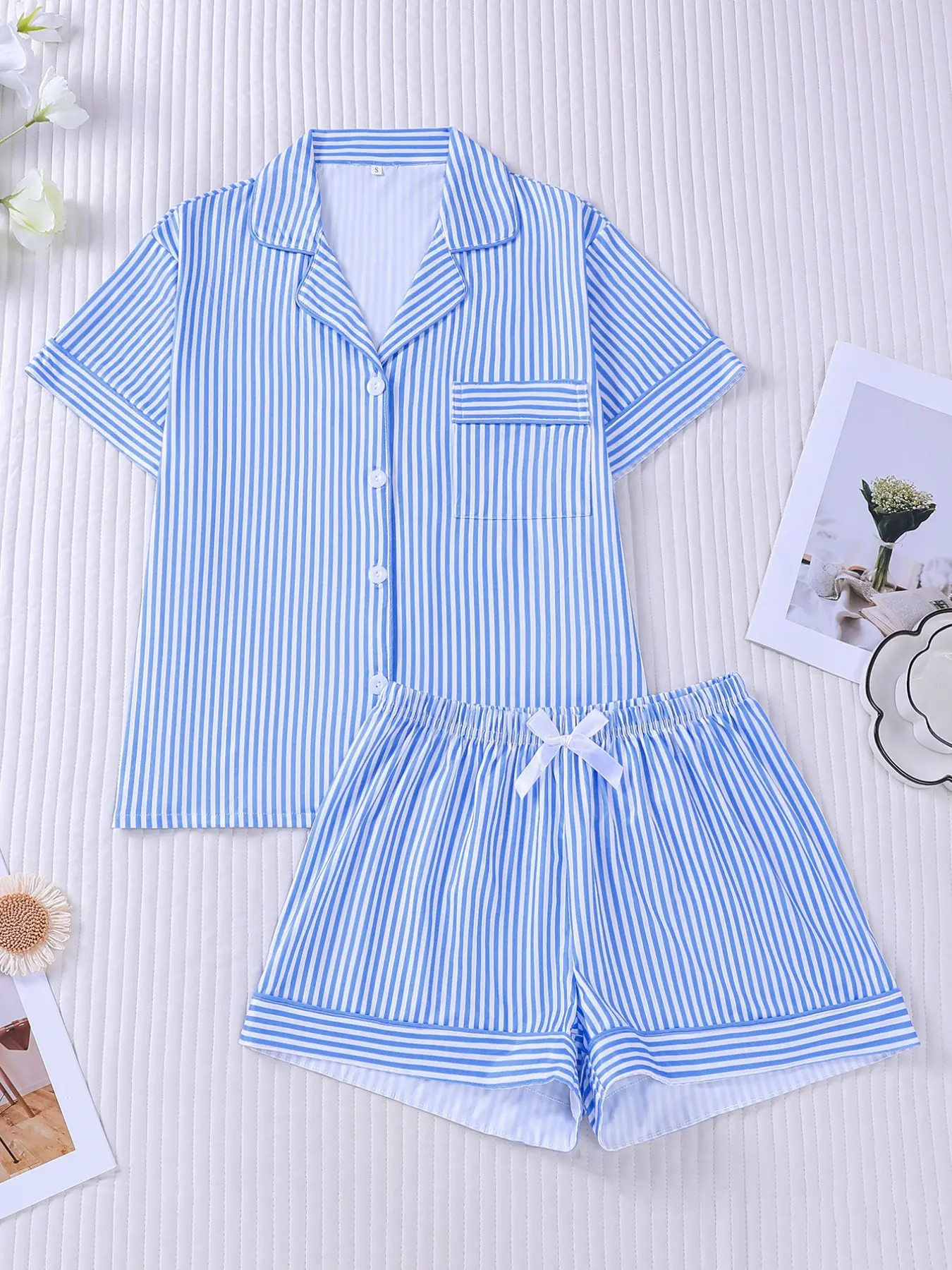 Women's 2-piece pajama set, fresh blue & white thin vertical stripes, simple casual style with matching piping trim. Lapel short sleeve top with chest pocket, comfy elastic waist shorts, soft lightweight loungewear for women, all-season daily home wear
