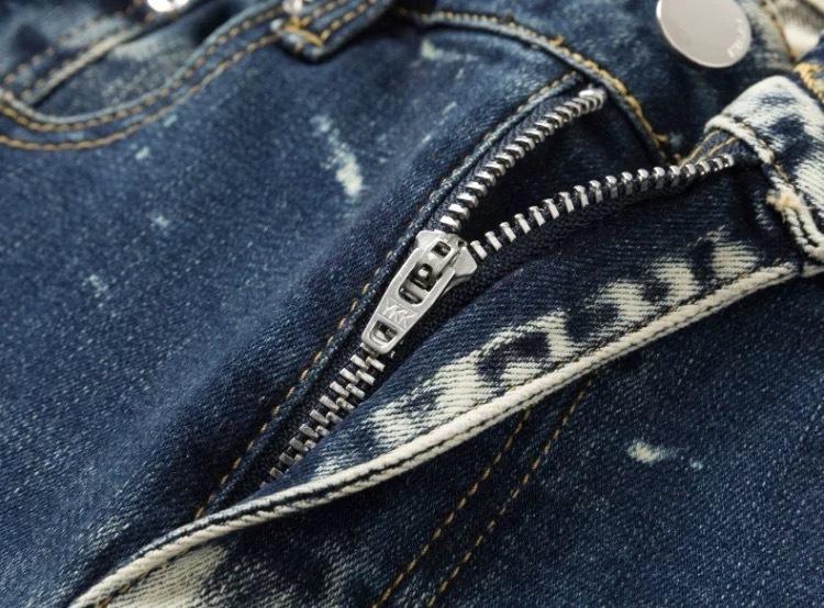 YYK Brand: Street-Style Distressed, Skinny-Fit Stretch Jeans-Featuring Patches, Embroidery, and a Vintage Denim Aesthetic-Showcasing Casual and Fitness-Inspired Styling