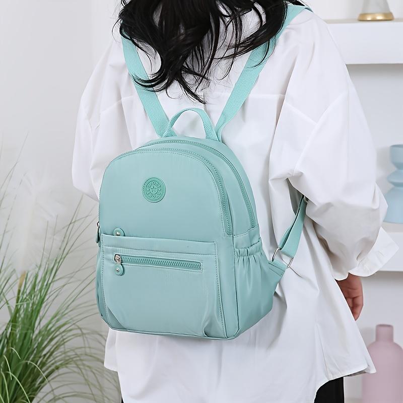 Chic Nylon Women’s Backpack – Versatile Stylish Bag with Adjustable Straps and Multiple Compartments for Work, Travel & School, Available in Gray, Purple, Black