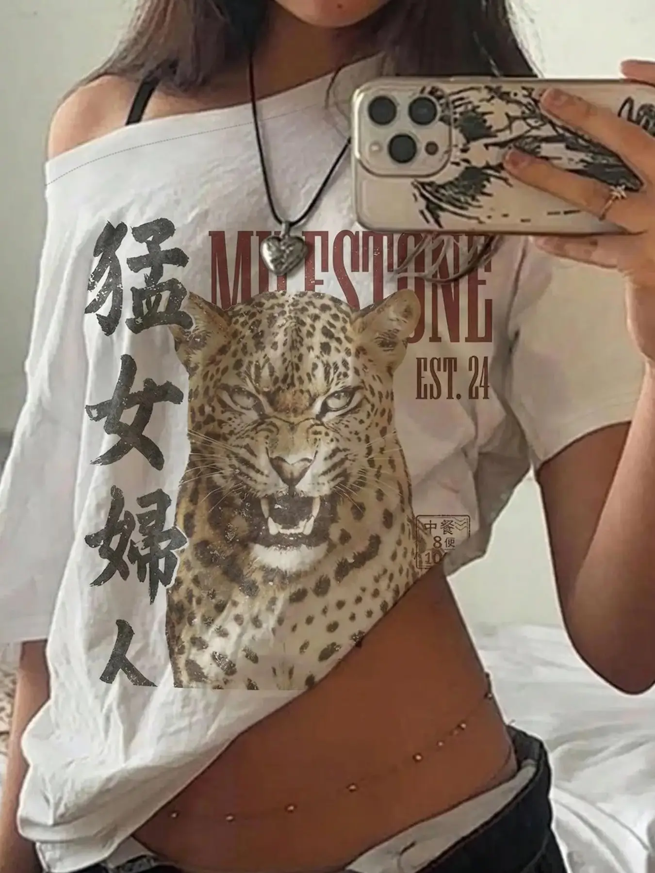 Y2K leopard and Tigergraphic tees featuring  prints, Asymmetrical off-the-shoulder short-sleeve tops—perfect for street style, Summer everyday wear, And back-to-school outfits.