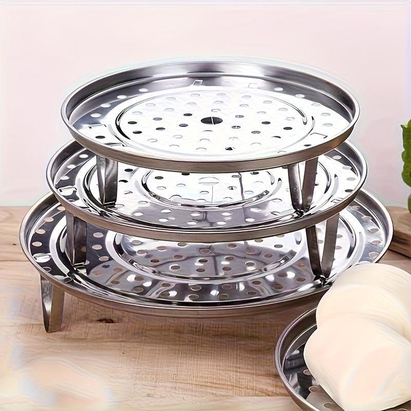 Set of 3 Stainless Steel Steaming Racks Featuring a Removable Three-Legged Base, Versatile for Steaming And Baking in Pots. Available in Silver, Suitable for Various Cooking Needs in Large, Medium, And Small Sizes.