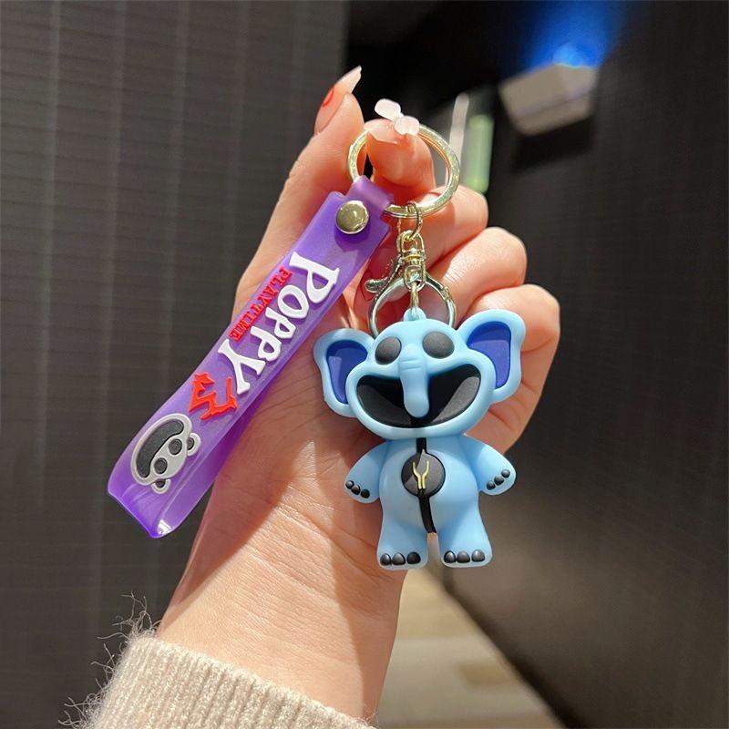 Smiling critters scary smiling animal doll keychain pink piggy blue elephant pendant