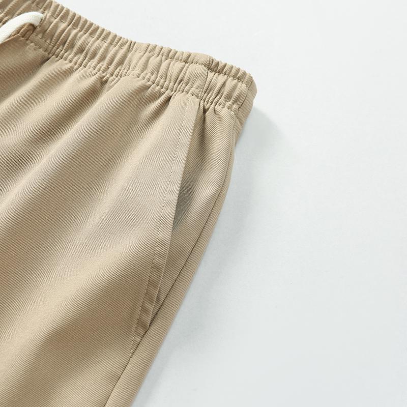 Men's work pants, solid color, equipped with multiple practical pockets, made of non stretch fabric, suitable for hiking trips, spring/autumn outdoor activities, and everyday casual occasions, men's casual pants