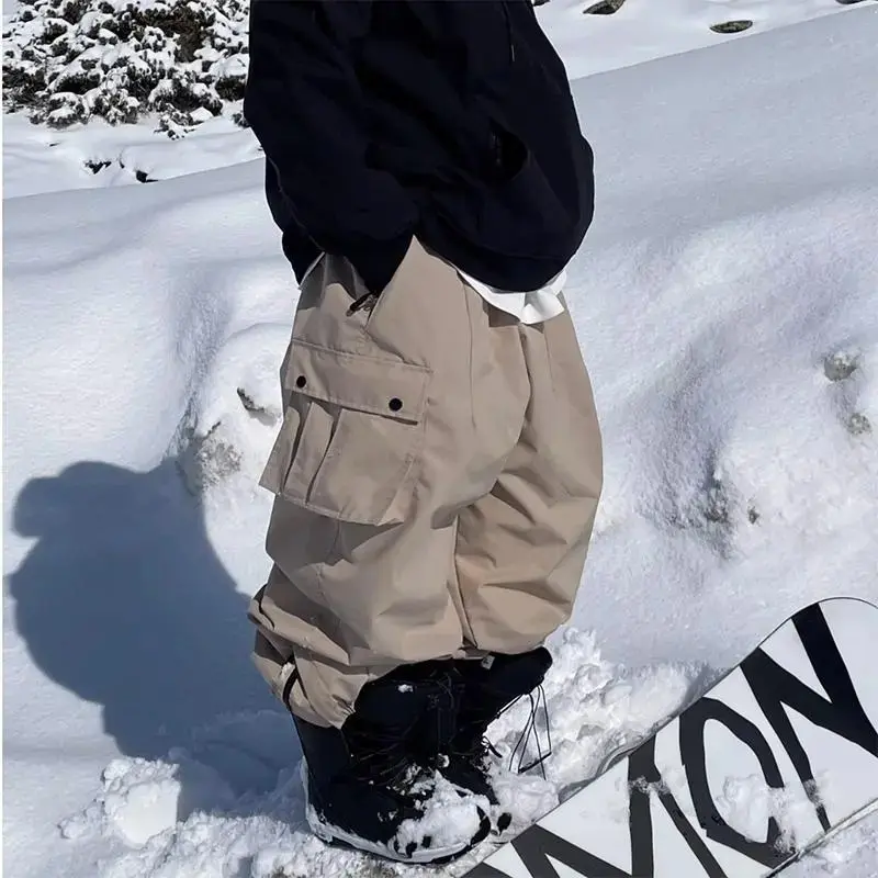 Women Men Oversize Ski Pants Unisex Outdoor Windproof Waterproof Snow Sports Skiing Bibs Trousers Snowboarding Pants Cargo Pants